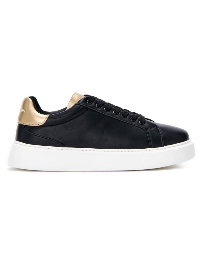 Martin Valen Iconic men's black-and-gold sneakers, side view showing thick white platform sole