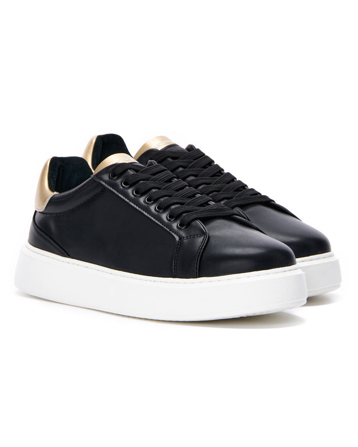 Martin Valen Iconic black-gold pair, close-up on the upper and lace eyelets